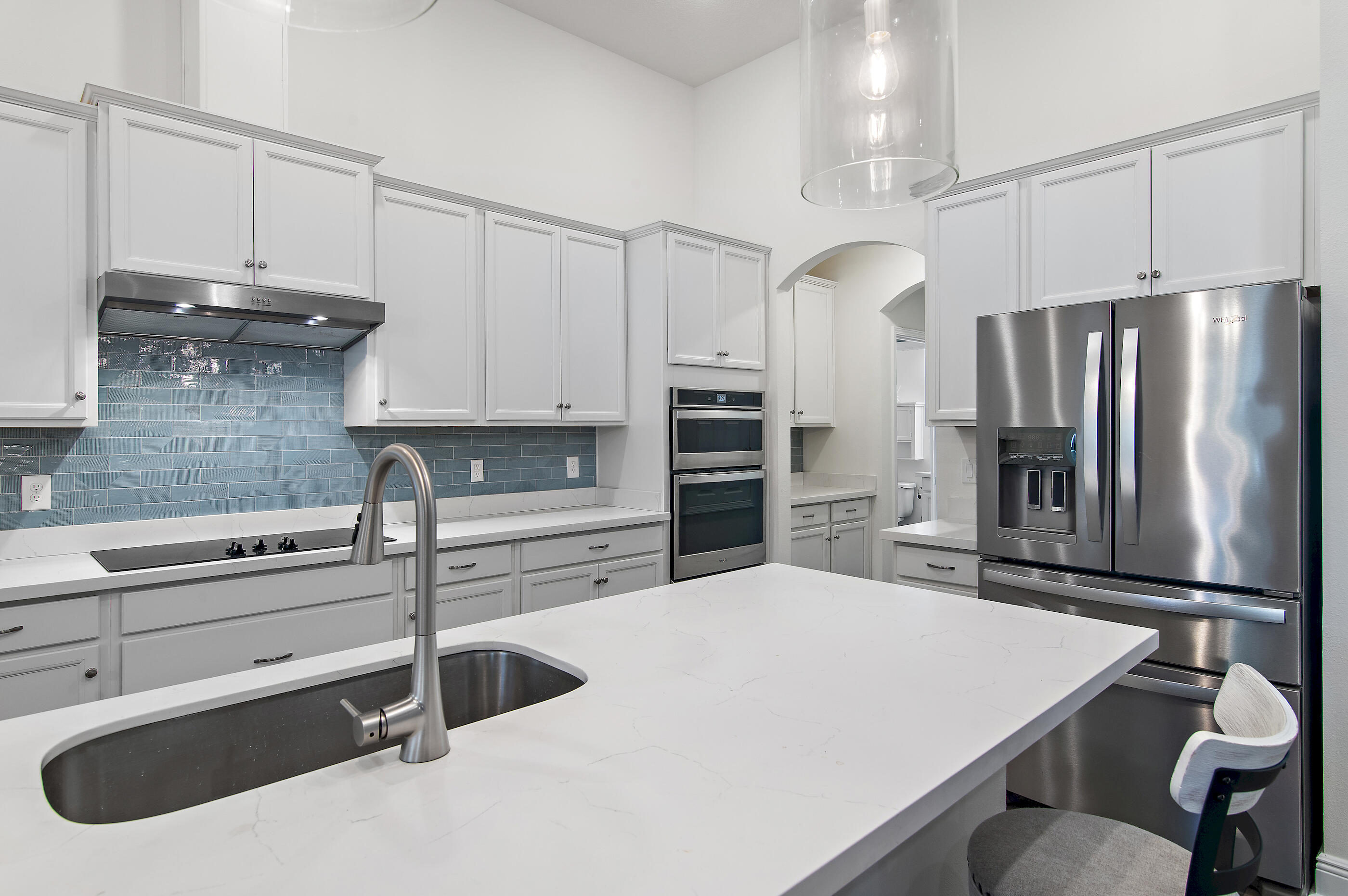 588 Windswept Boulevard Freeport, FL 32439 - Photo 11 of 62 a kitchen with refrigerator and cabinets