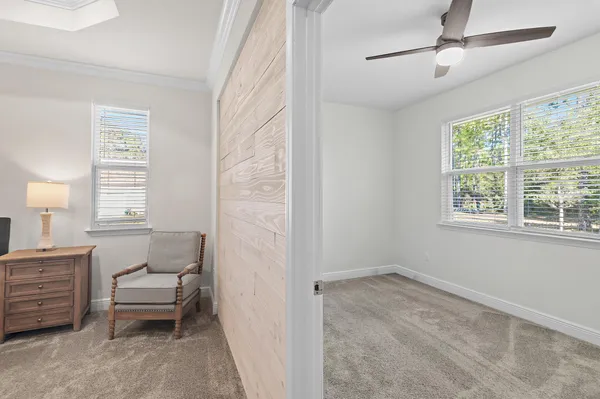 a room with a sink and a mirror