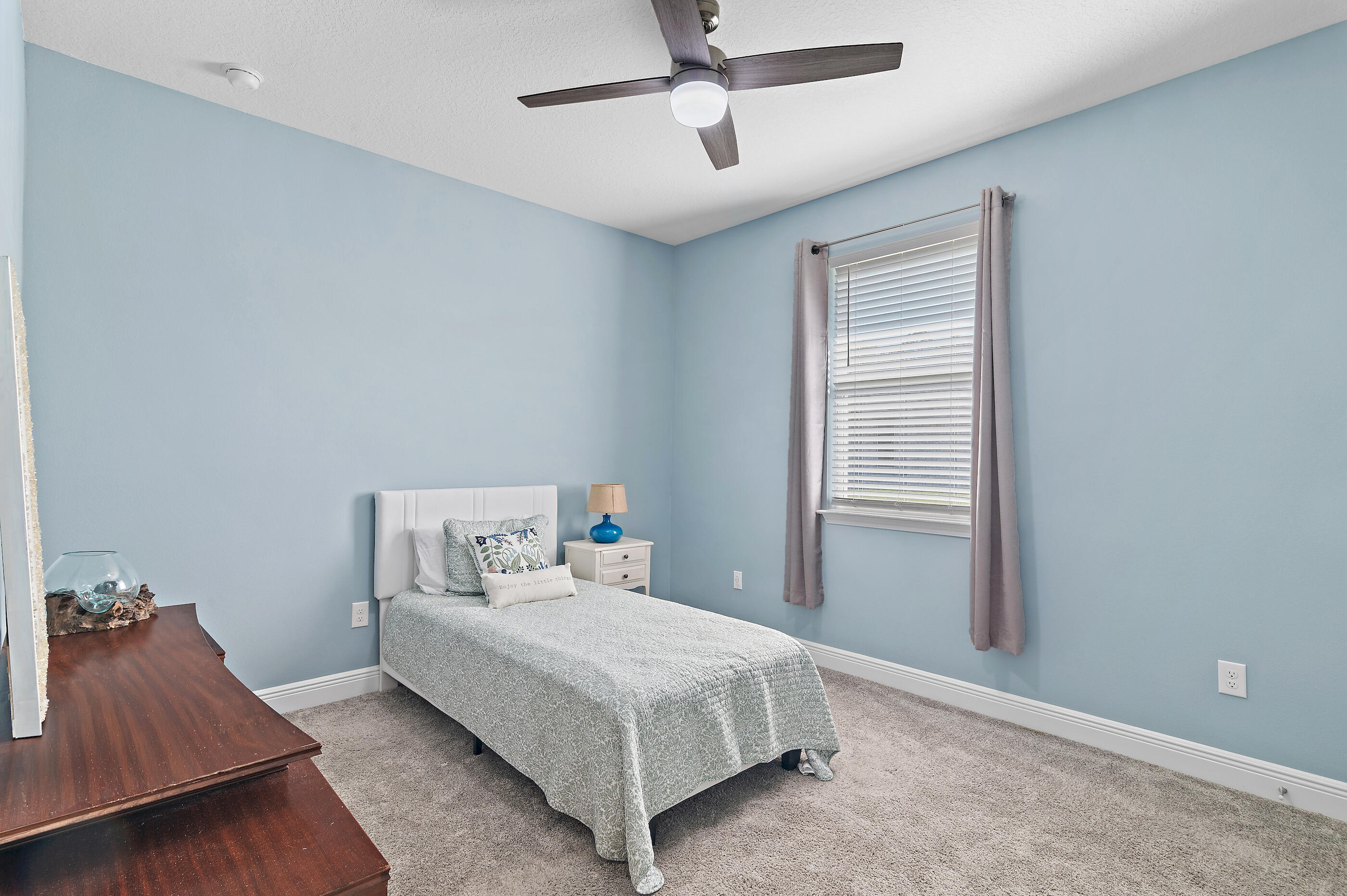 588 Windswept Boulevard Freeport, FL 32439 - Photo 26 of 62 a bedroom with a bed and window