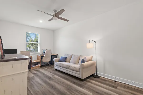 a view of a swimming pool with a yard