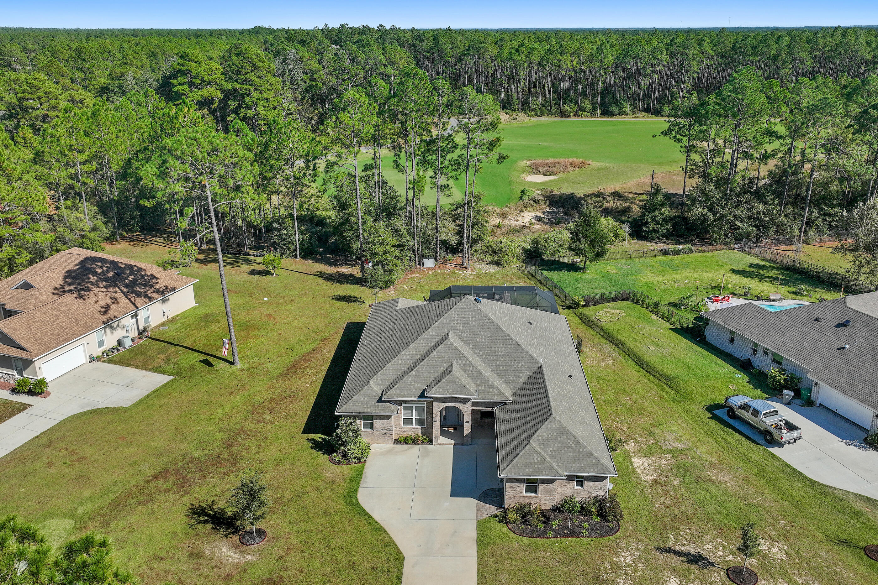 588 Windswept Boulevard Freeport, FL 32439 - Photo 43 of 62 an aerial view of a house with a yard