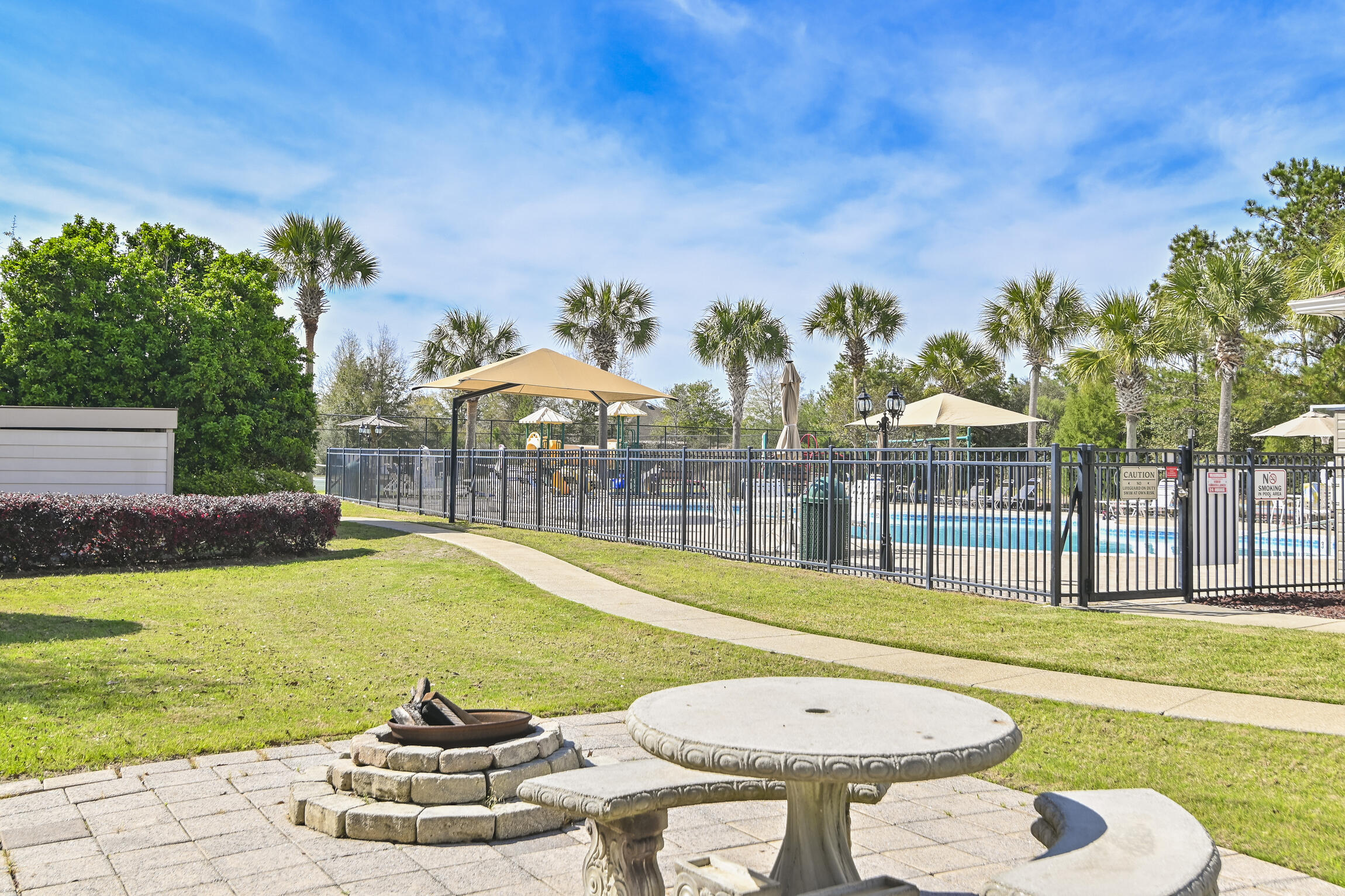 588 Windswept Boulevard Freeport, FL 32439 - Photo 57 of 62 a view of a swimming pool with a patio