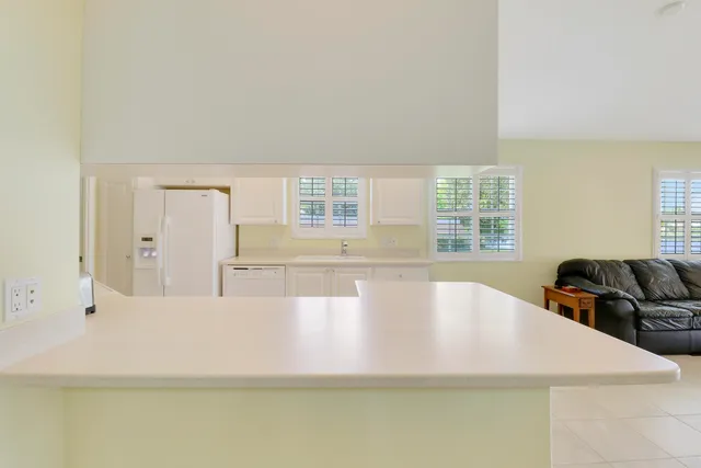 a view of a living room and dining room