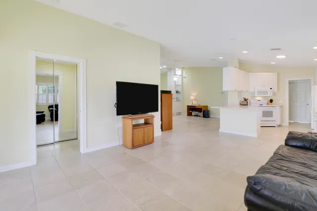 a bed room with a bed and a lamp