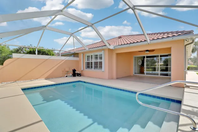 a view of a house with a swimming pool