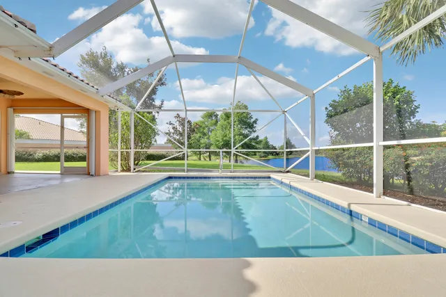 a view of a lake with a big yard