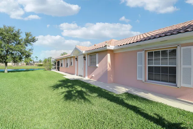 a view of a house with a garden