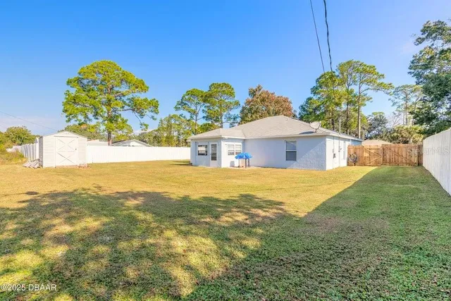 a house view with a swimming pool
