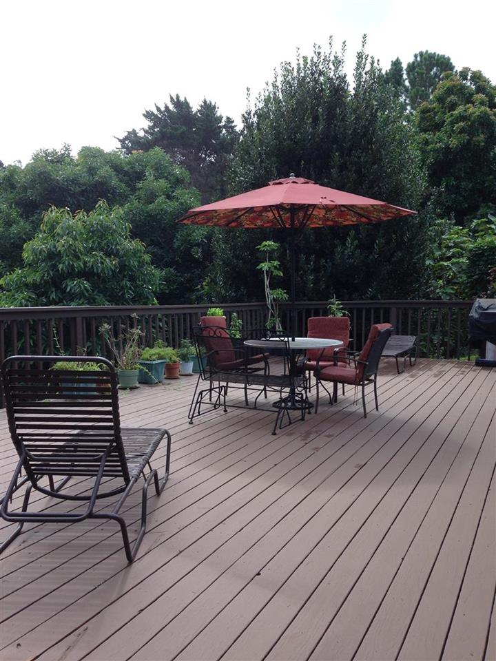 339 Ainakula Road Kula, HI 96790 - Photo 12 of 20 a view of backyard with hardwood deck and outdoor seating