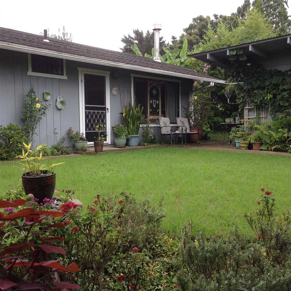 339 Ainakula Road Kula, HI 96790 - Photo 13 of 20 a view of a house with backyard sitting area and garden