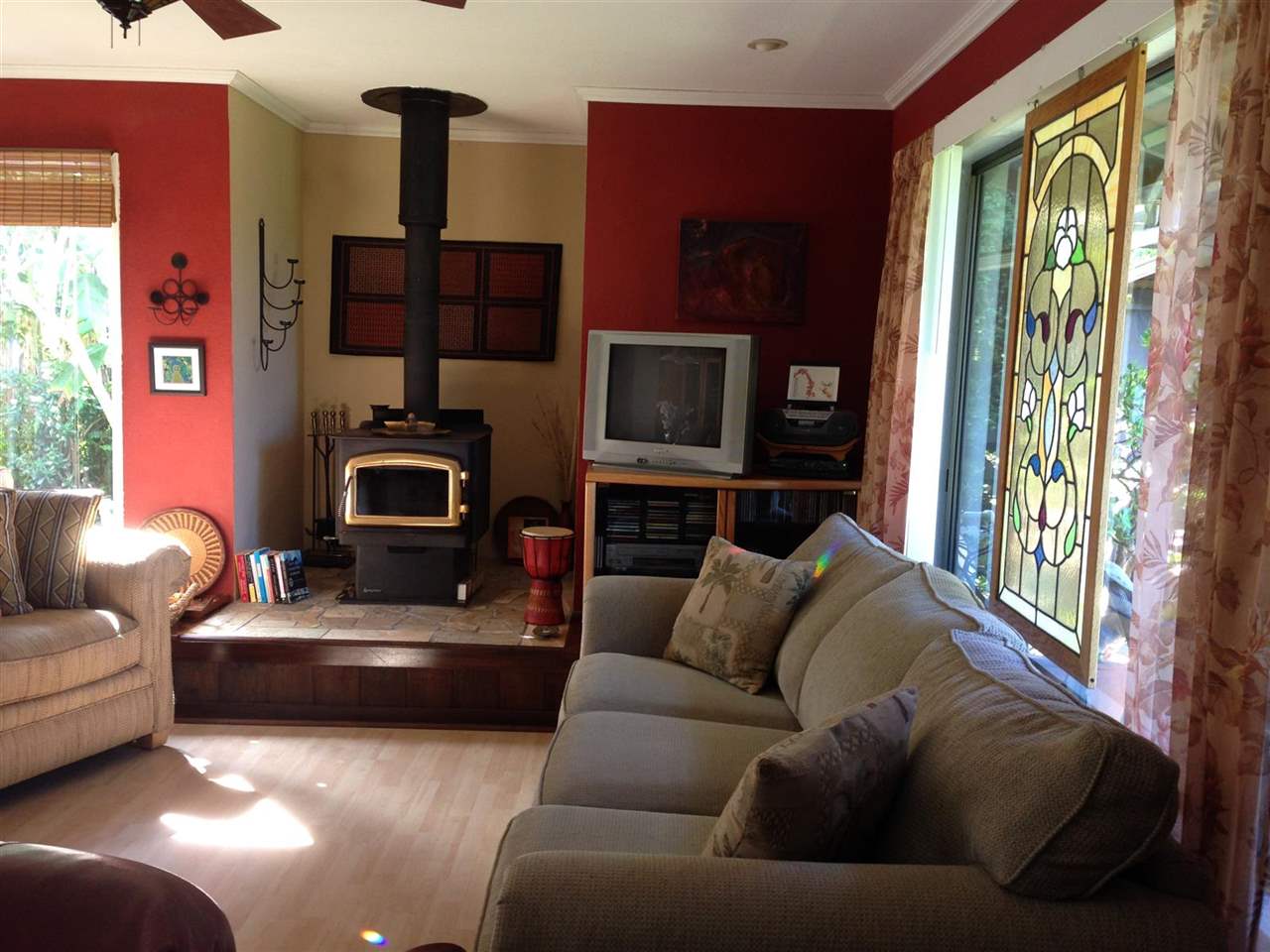 339 Ainakula Road Kula, HI 96790 - Photo 19 of 20 a living room with furniture and a flat screen tv
