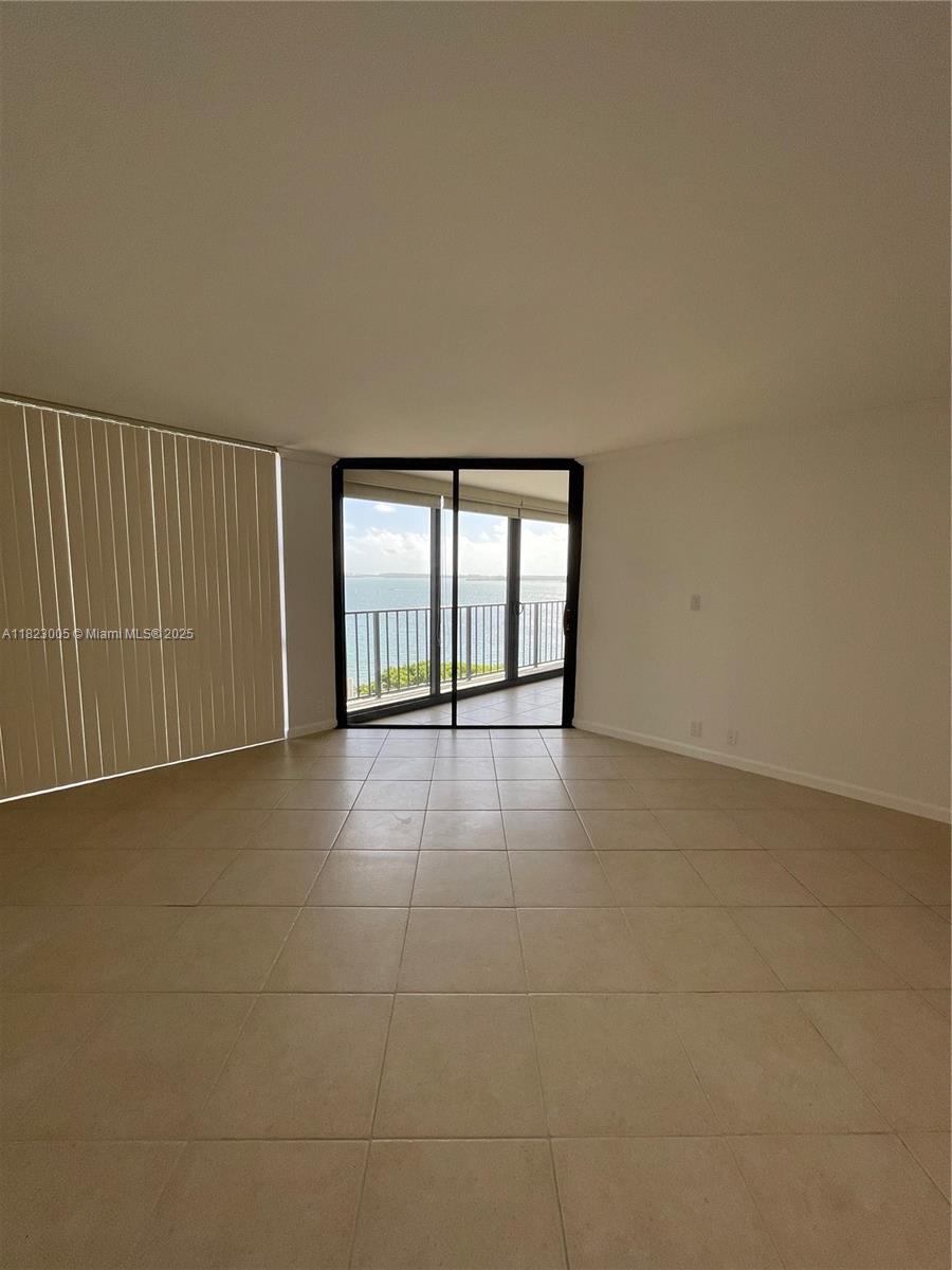 Brickell Place Miami, FL 33129 - Photo 21 of 24 a view of an empty room with a window