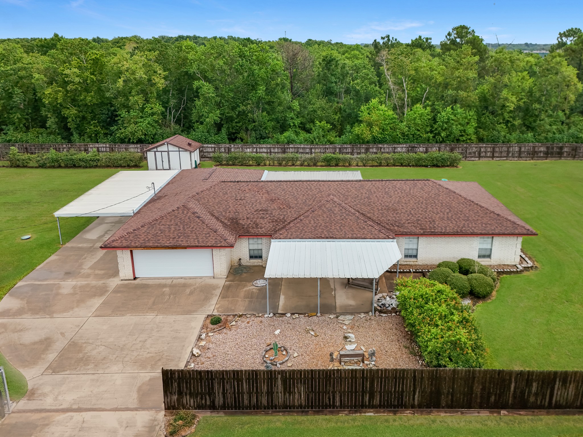 7315 Pine Street Manvel, TX 77578 - Photo 10 of 50 an aerial view of a house with a yard