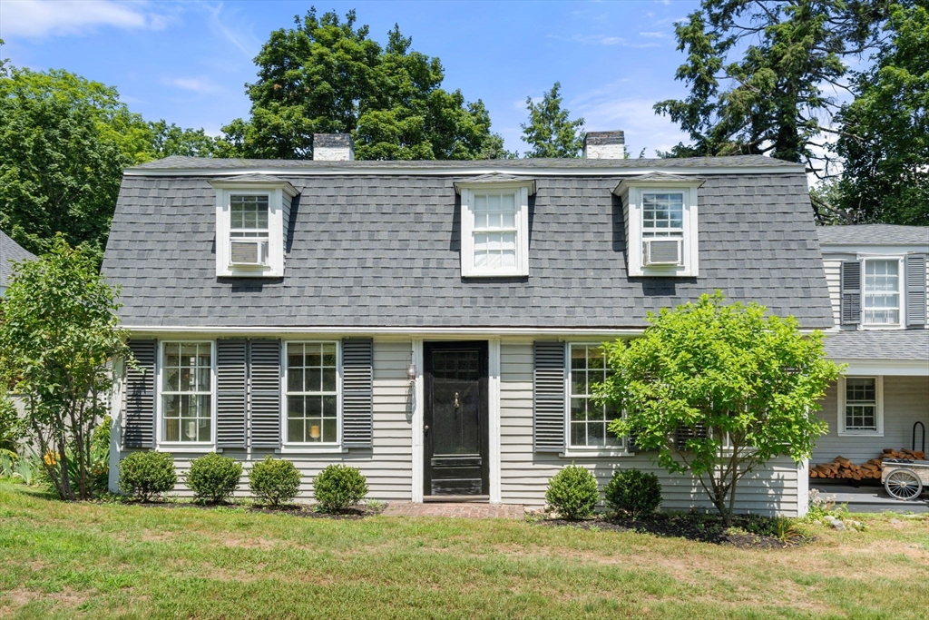165 Highland Street, Unit 165 Dedham, MA 02026 - Photo 2 of 40 front view of a house with a yard