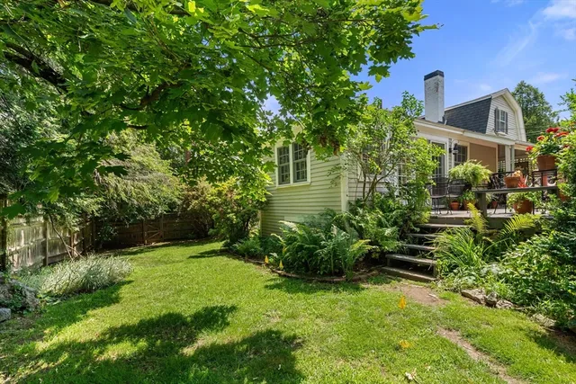 a view of backyard with green space