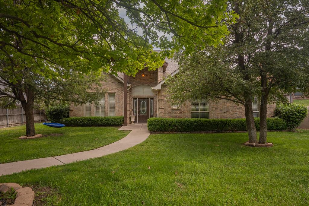 6607 Sumac Place Amarillo, TX 79124 - Photo 1 of 33 a view of a yard in front of house