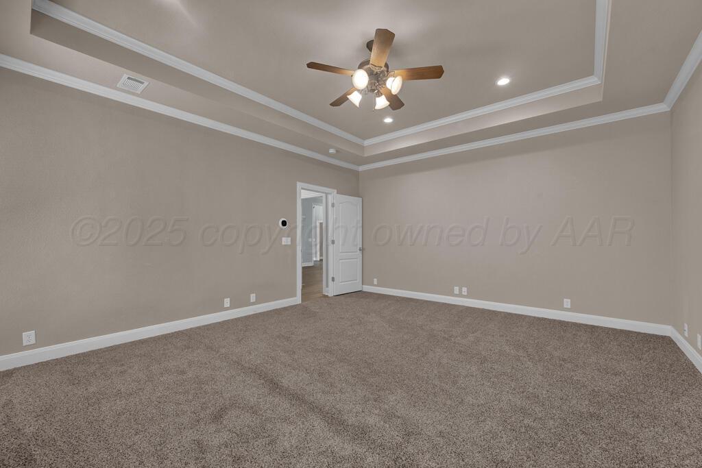 6607 Sumac Place Amarillo, TX 79124 - Photo 13 of 33 a view of an empty room with a chandelier fan