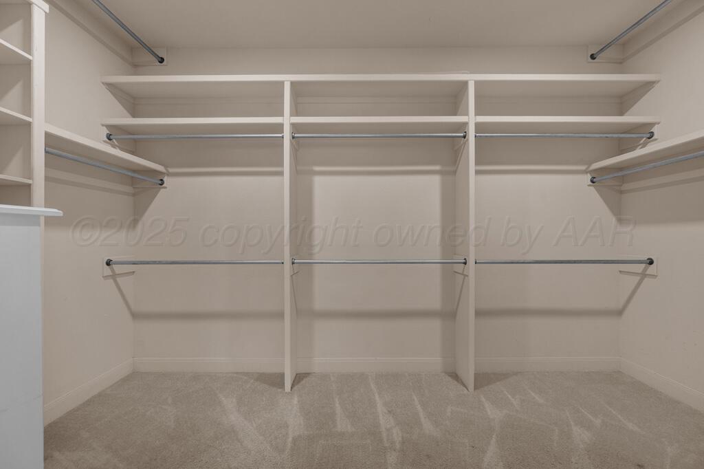 6607 Sumac Place Amarillo, TX 79124 - Photo 16 of 33 a view of an empty walk in closet