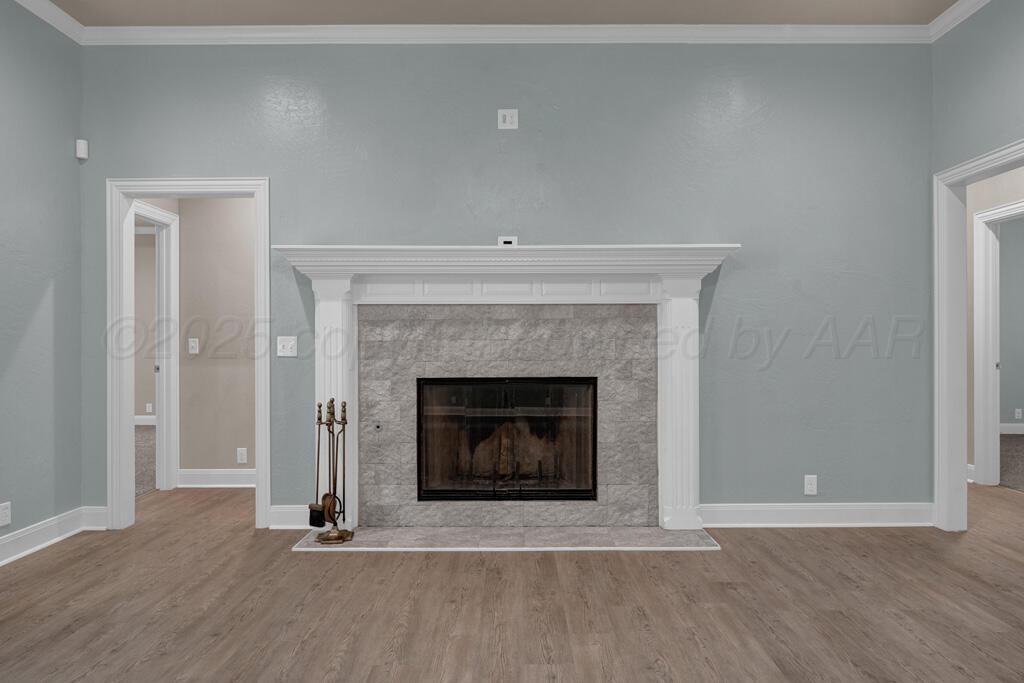 6607 Sumac Place Amarillo, TX 79124 - Photo 3 of 33 a living room with a fireplace