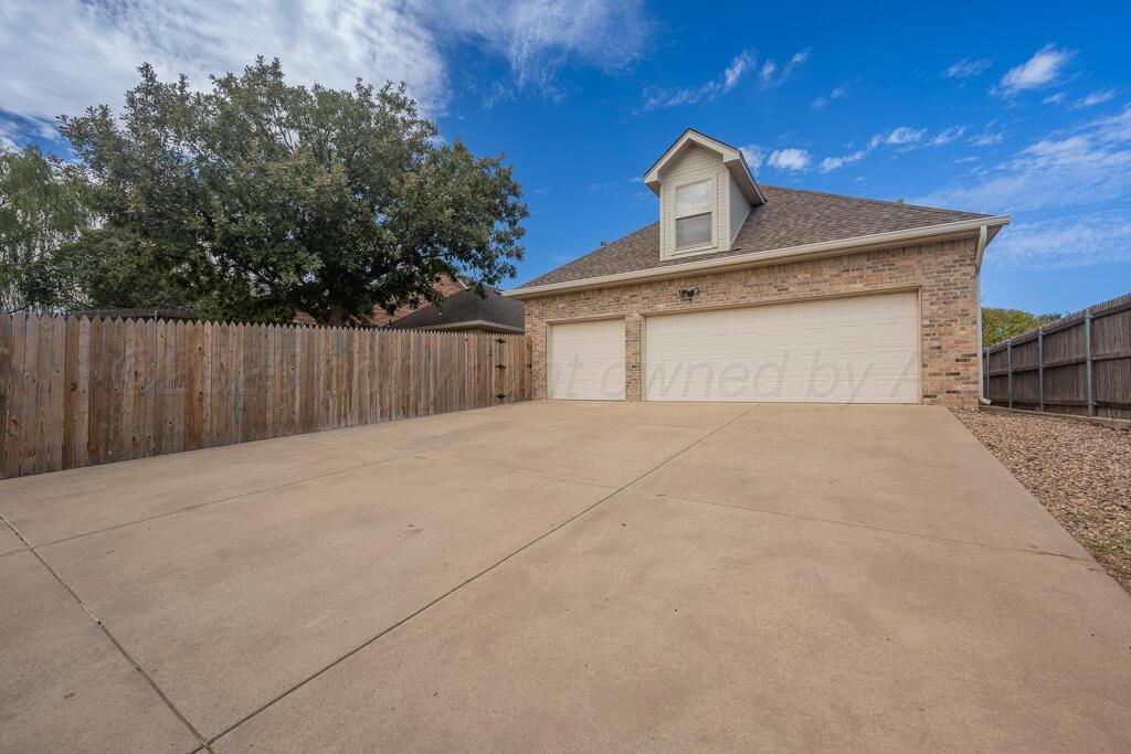 6607 Sumac Place Amarillo, TX 79124 - Photo 32 of 33 a view of backyard of house