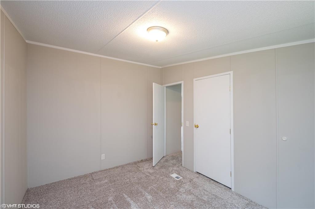 996 Guerrant Springs Road Ruffin, NC 27326 - Photo 22 of 25 Second Bedroom