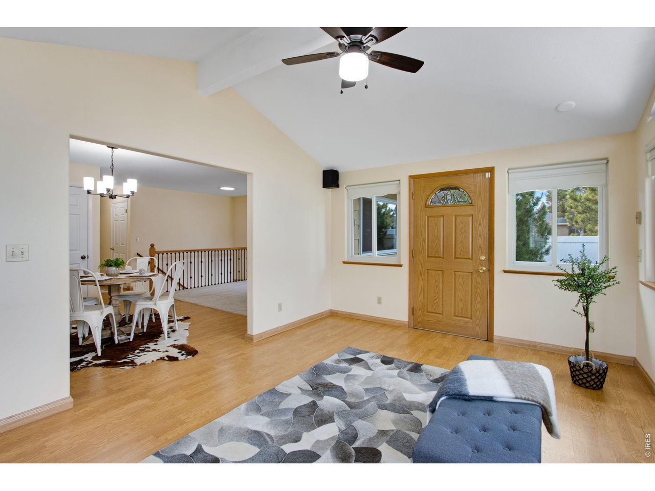 300 Ruth Street Fort Collins, CO 80525 - Photo 15 of 37 a living room with furniture and a large window