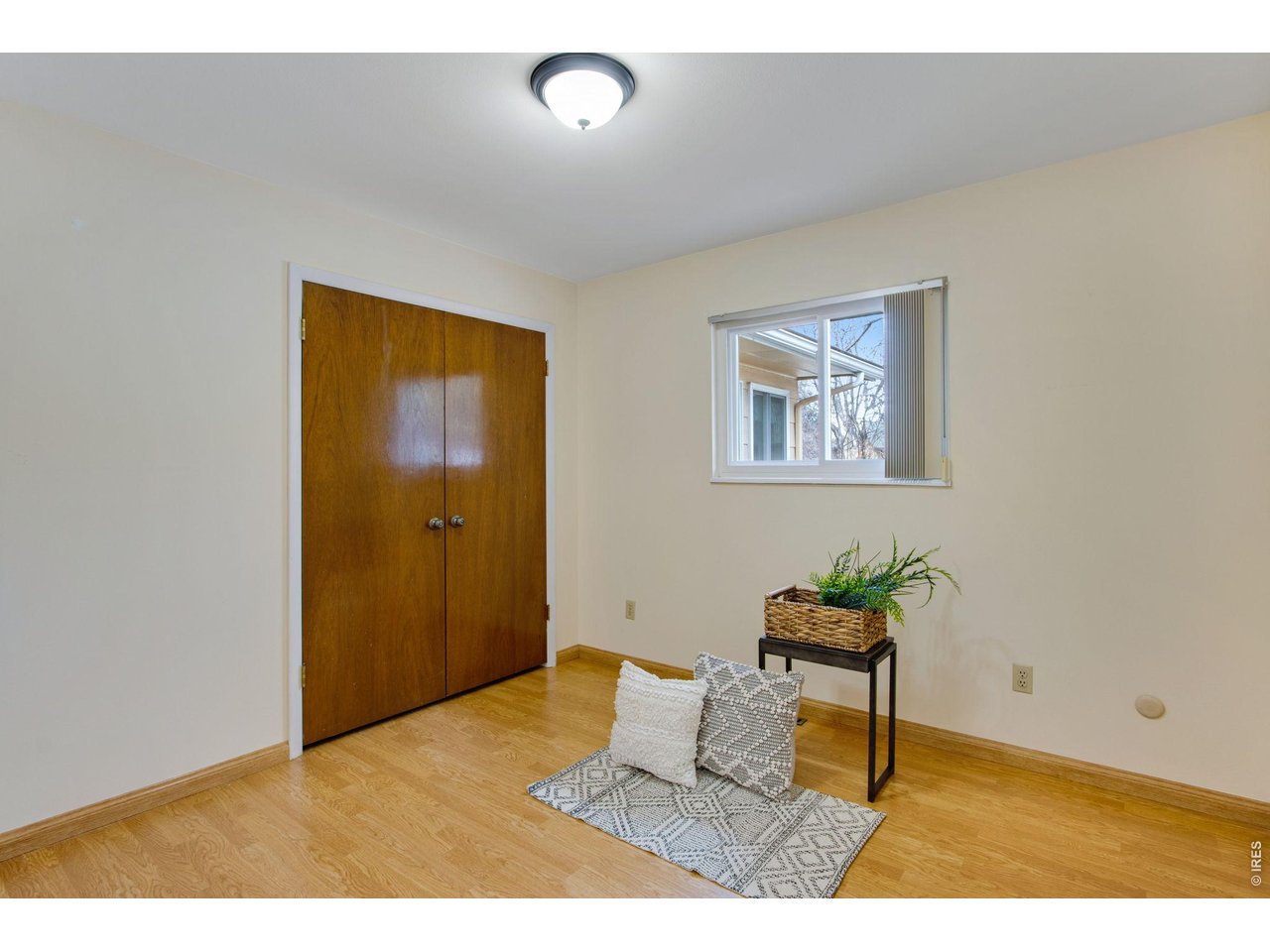 300 Ruth Street Fort Collins, CO 80525 - Photo 23 of 37 a living room with furniture and wooden floor