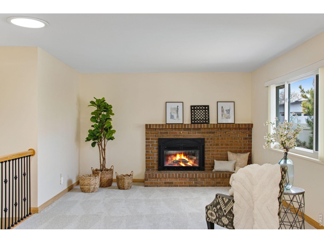 300 Ruth Street Fort Collins, CO 80525 - Photo 8 of 37 a living room with furniture and a fireplace