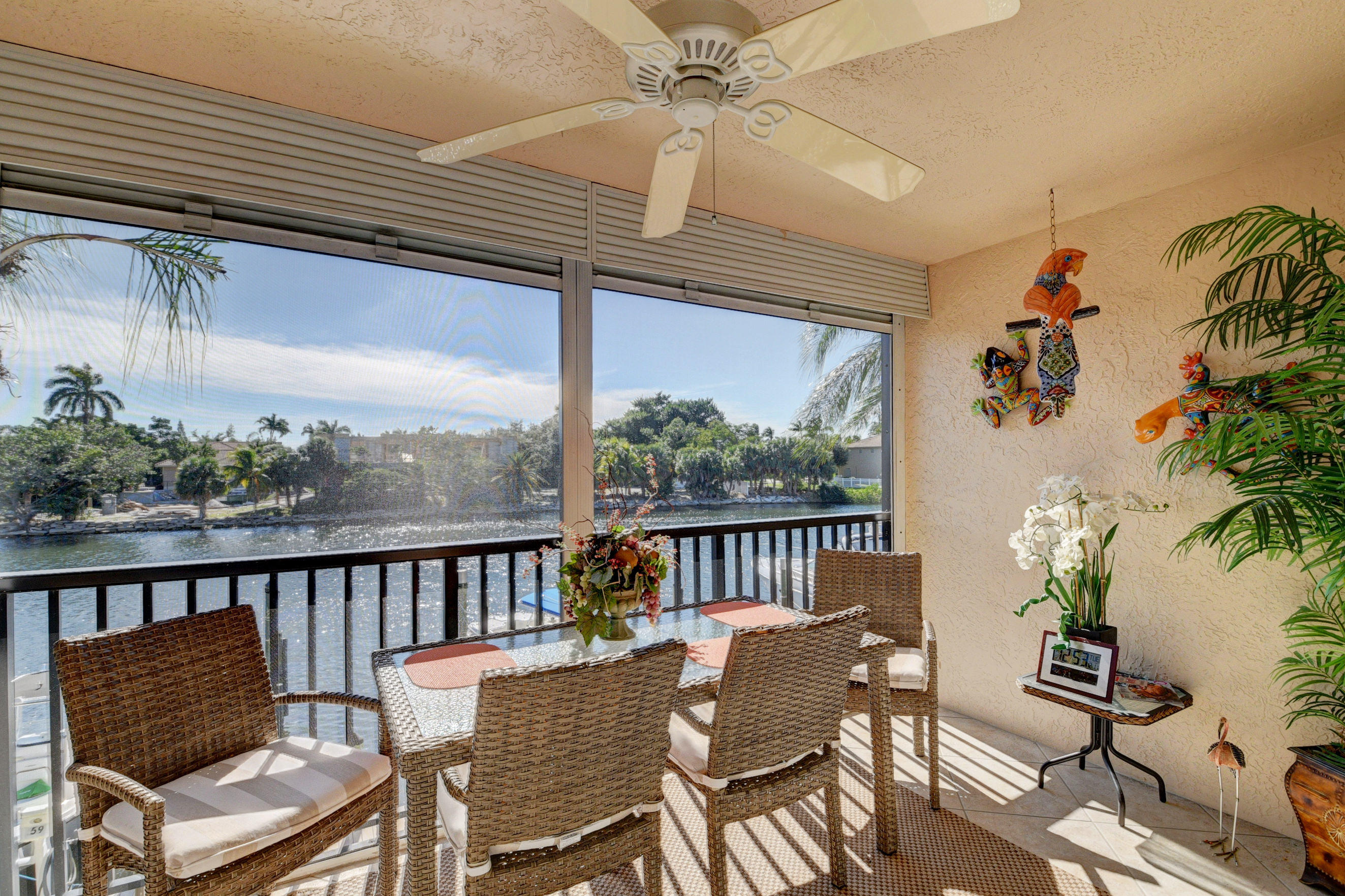 210 Captains Walk, Unit 710 Delray Beach, FL 33483 - Photo 29 of 49 a view of a chairs and table in the balcony