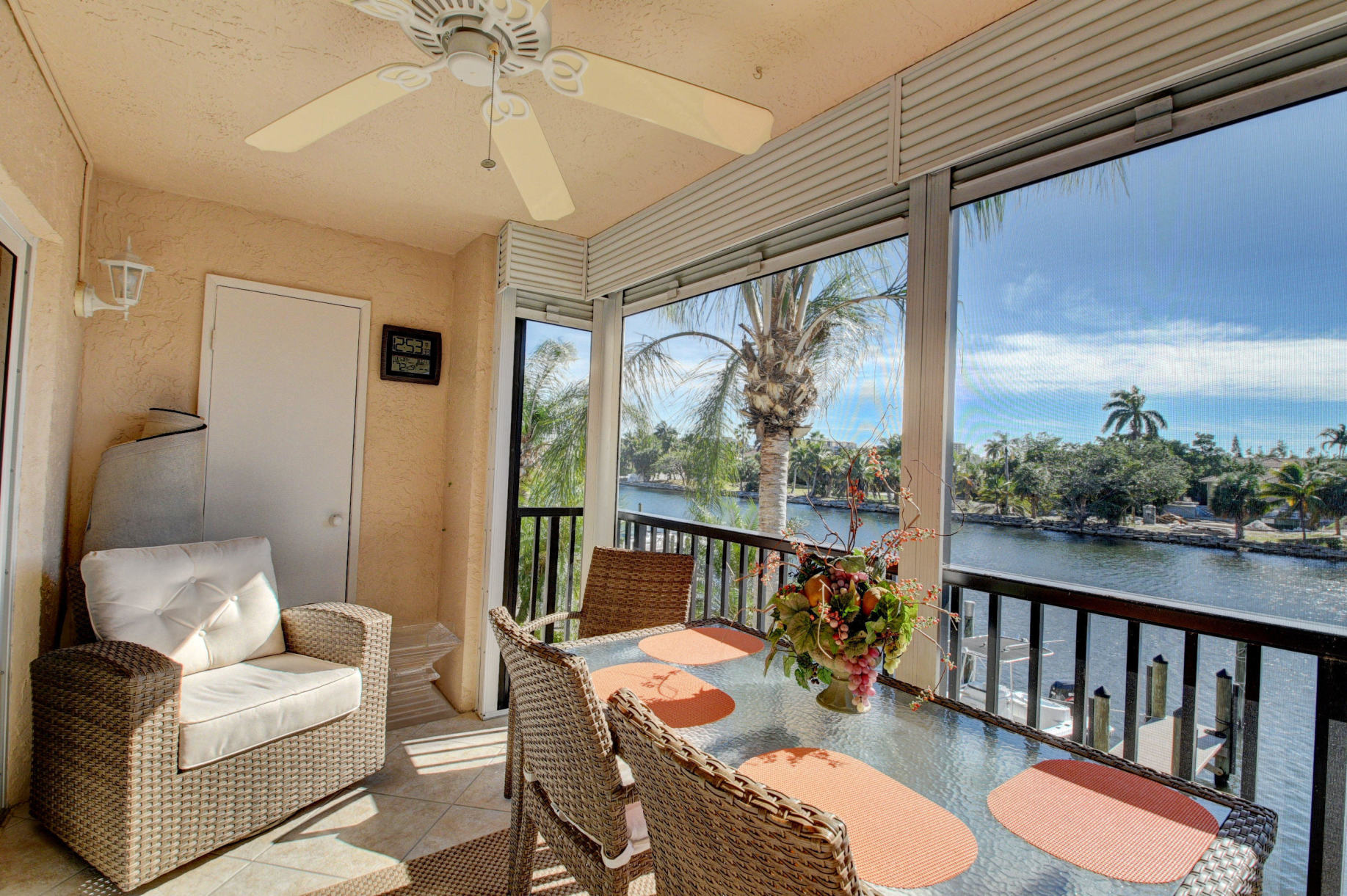 210 Captains Walk, Unit 710 Delray Beach, FL 33483 - Photo 30 of 49 a living room with furniture and a large window