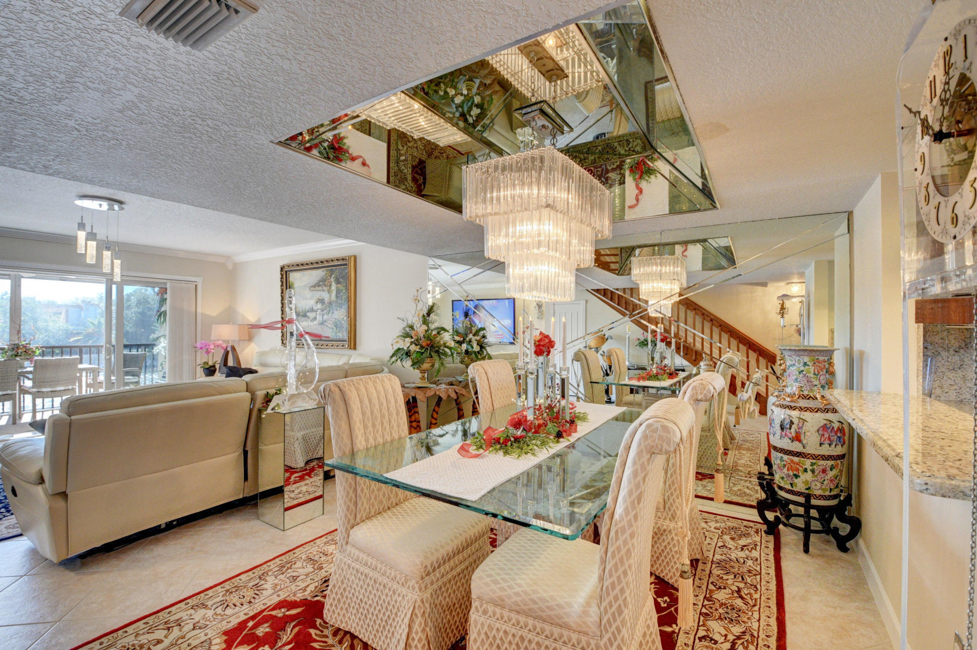 210 Captains Walk, Unit 710 Delray Beach, FL 33483 - Photo 4 of 49 a view of a livingroom with furniture and a living room