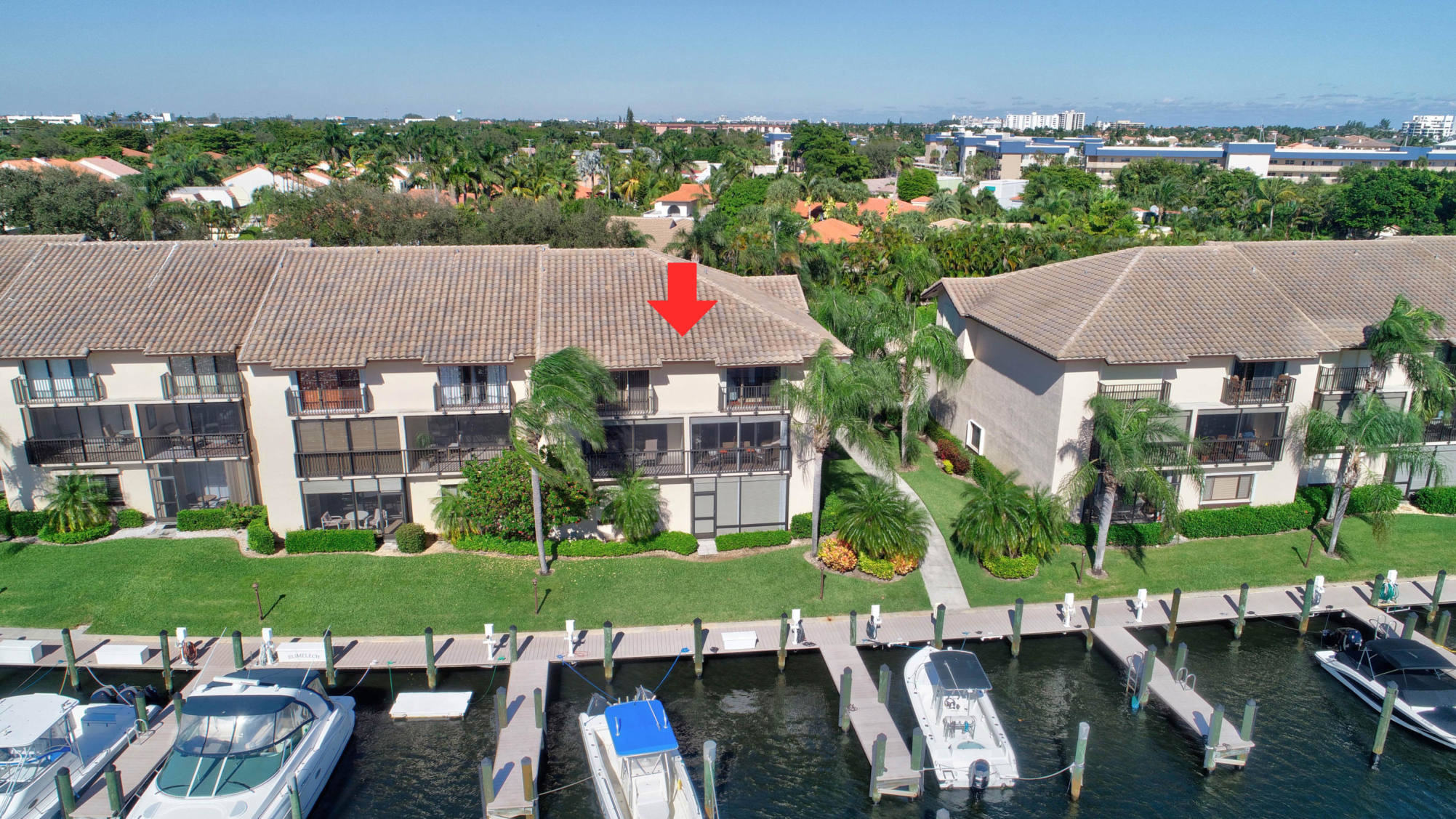 210 Captains Walk, Unit 710 Delray Beach, FL 33483 - Photo 37 of 49 an aerial view of a house with swimming pool patio and outdoor seating