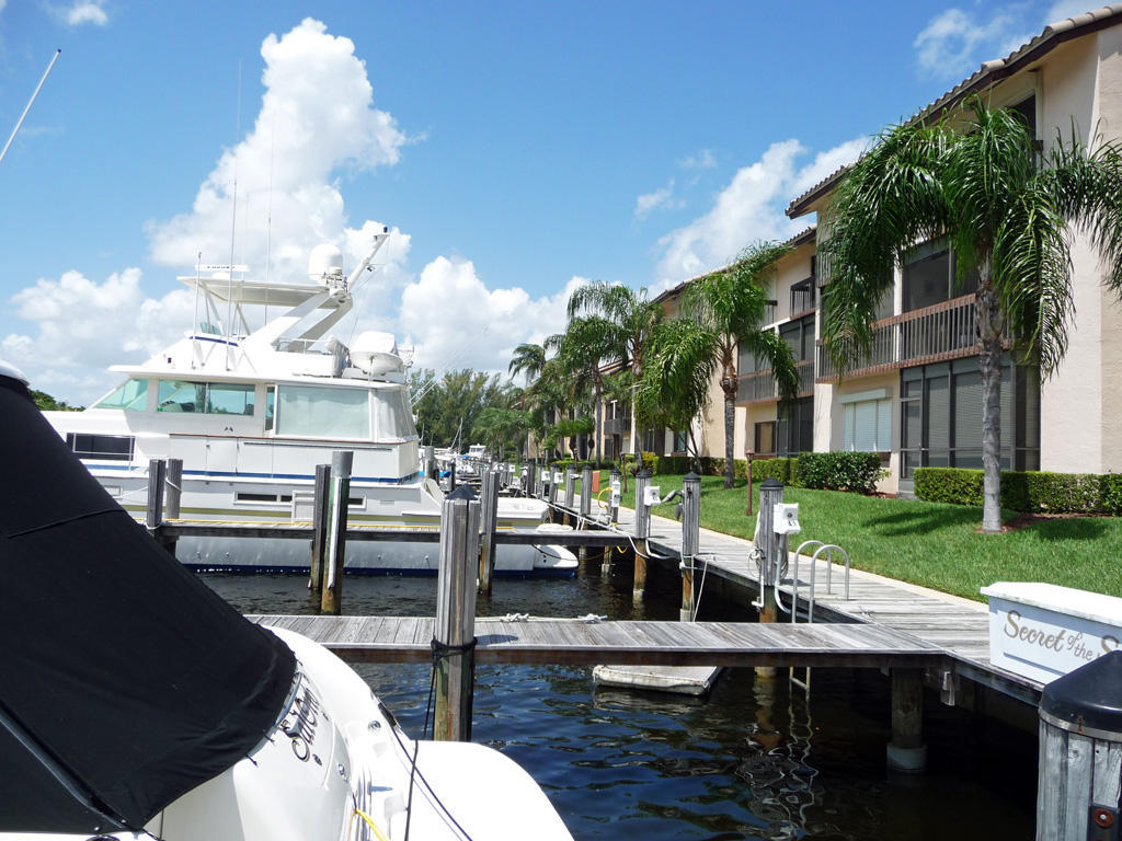 210 Captains Walk, Unit 710 Delray Beach, FL 33483 - Photo 38 of 49 a view of backyard with outdoor seating and green space