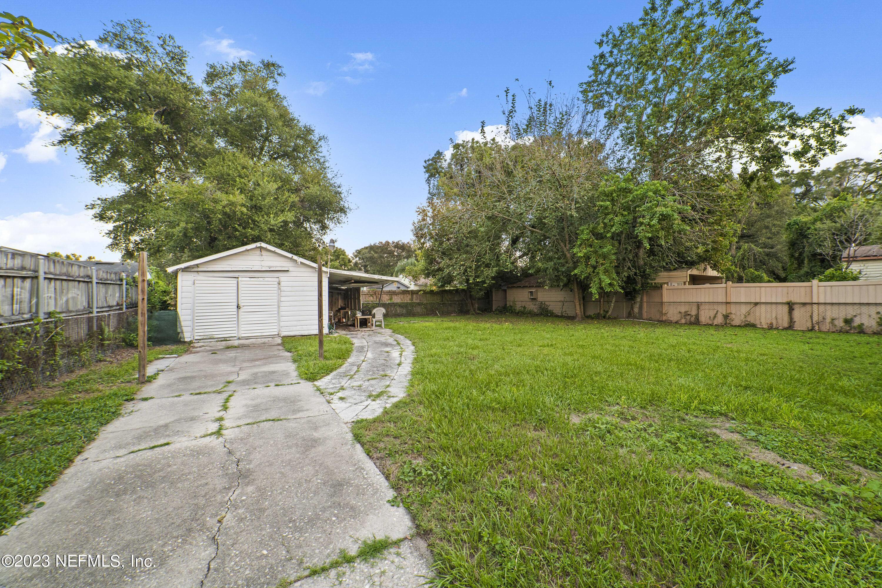 1719 Mayfair Road Jacksonville, FL 32207 - Photo 13 of 14 a view of a back yard of the house