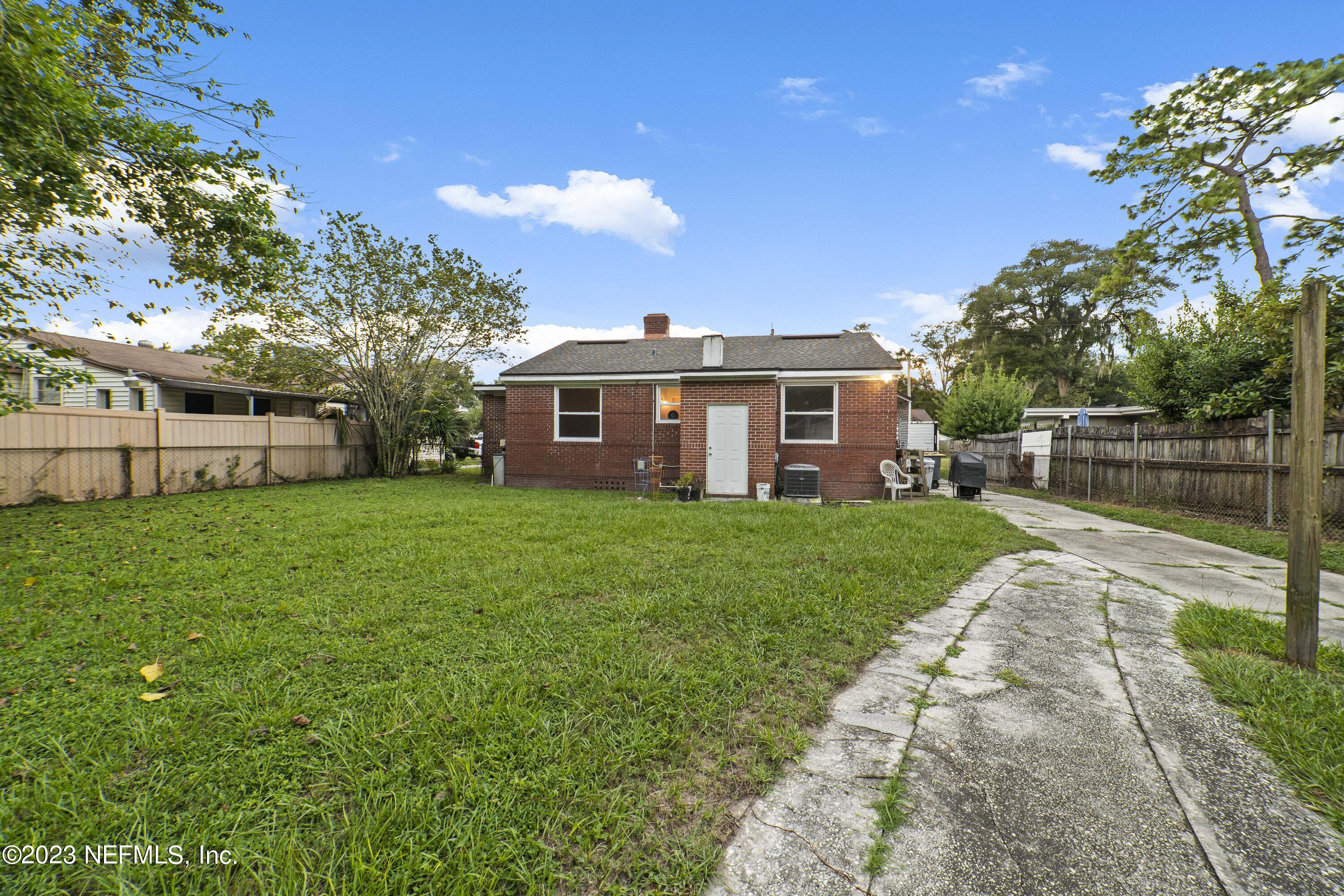 1719 Mayfair Road Jacksonville, FL 32207 - Photo 3 of 14 a view of house with a yard
