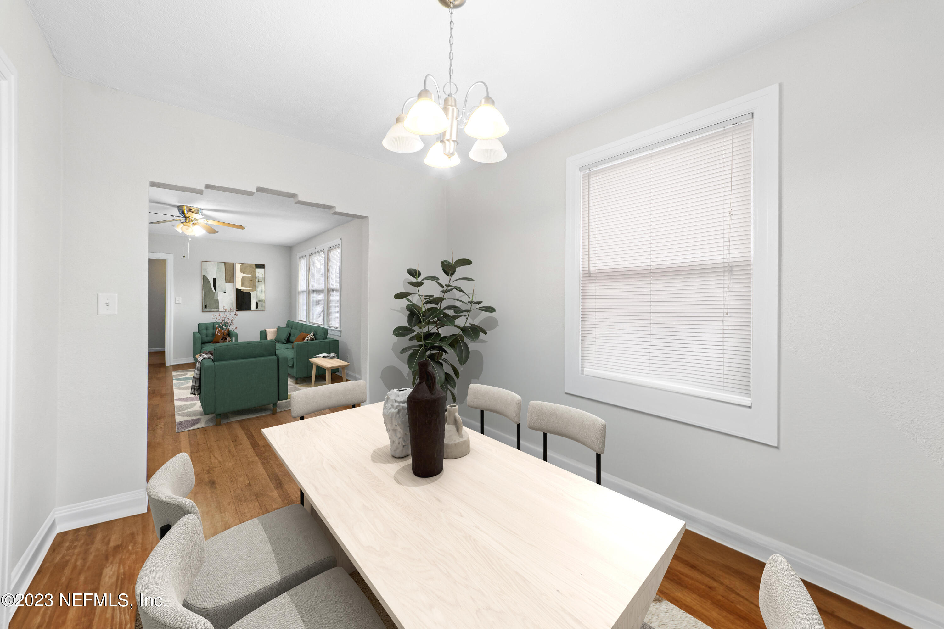 1719 Mayfair Road Jacksonville, FL 32207 - Photo 5 of 14 a view of a dining room with furniture and a chandelier