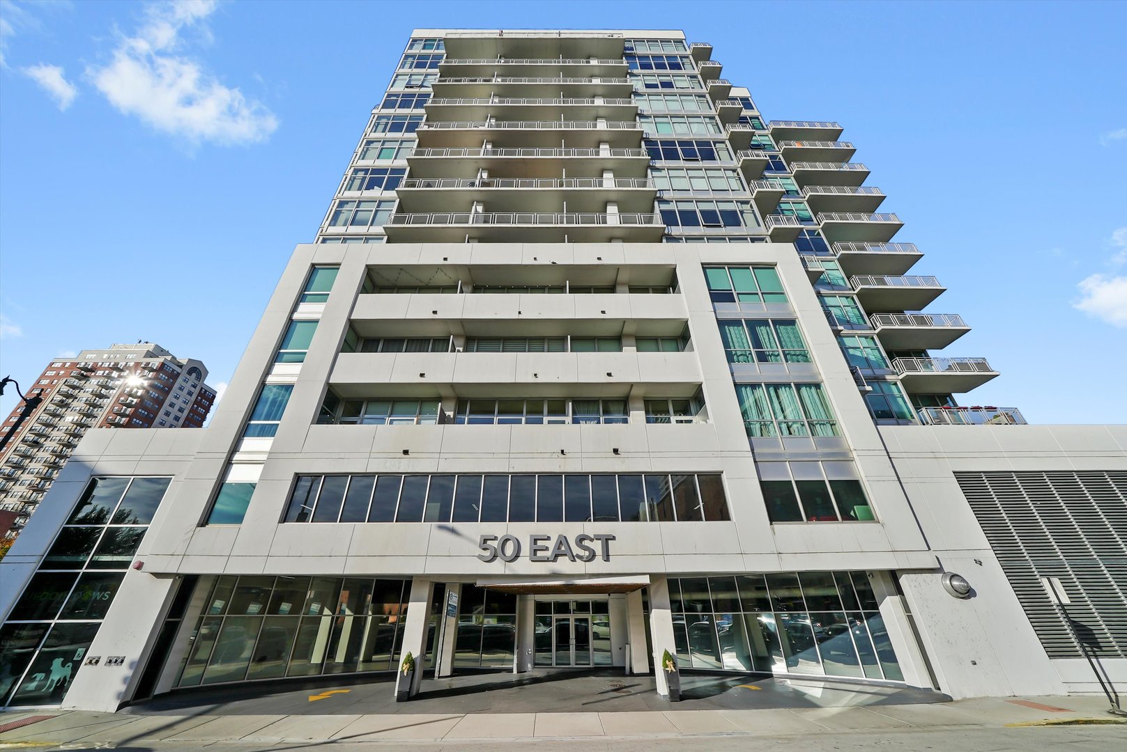 50 East 16th Street, Unit 411 Chicago, IL 60616 - Photo 1 of 2 a front view of a tall building