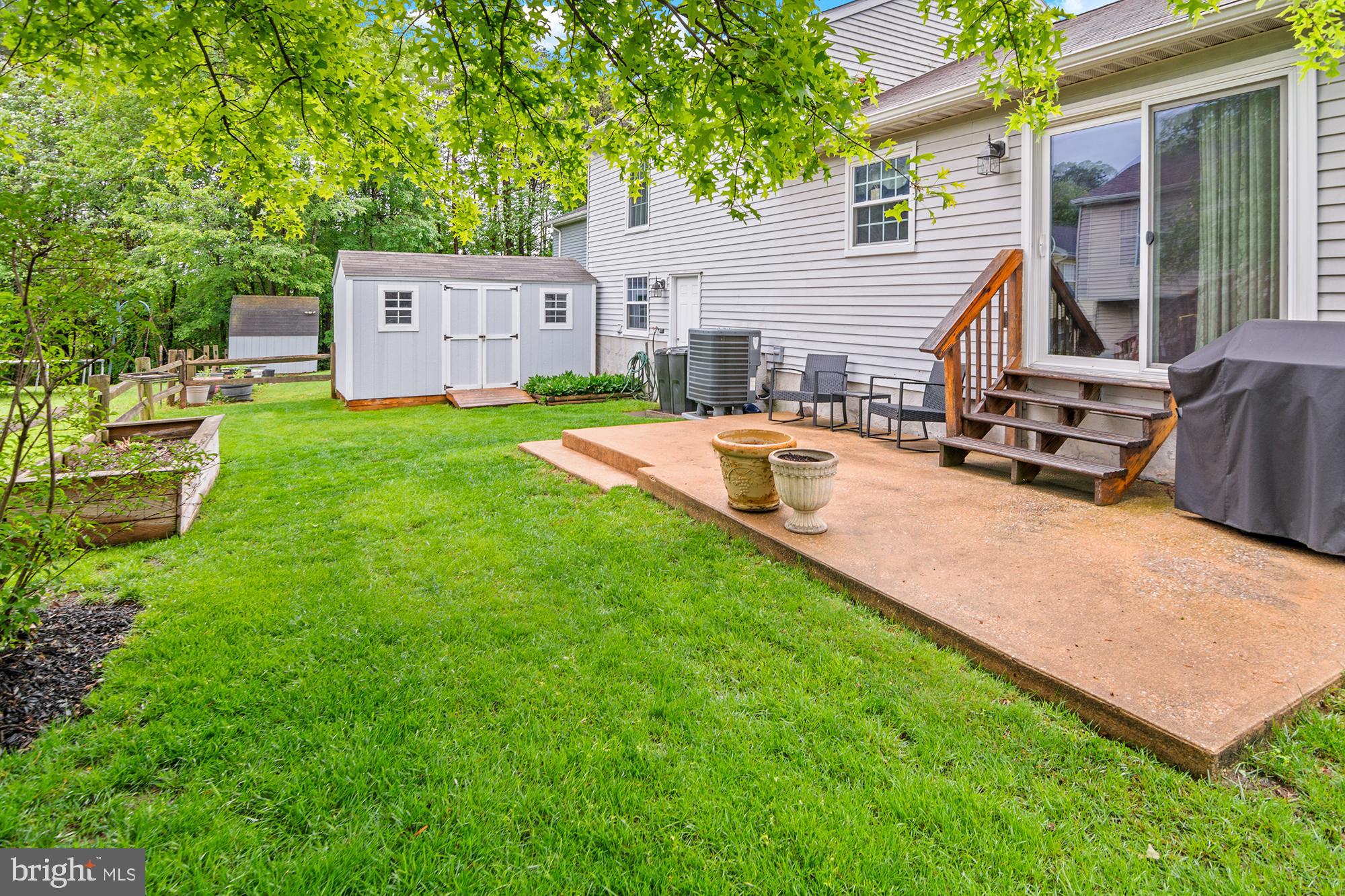 5117 Clifford Road Perry Hall, MD 21128 - Photo 31 of 36 a view of a house with backyard and sitting area