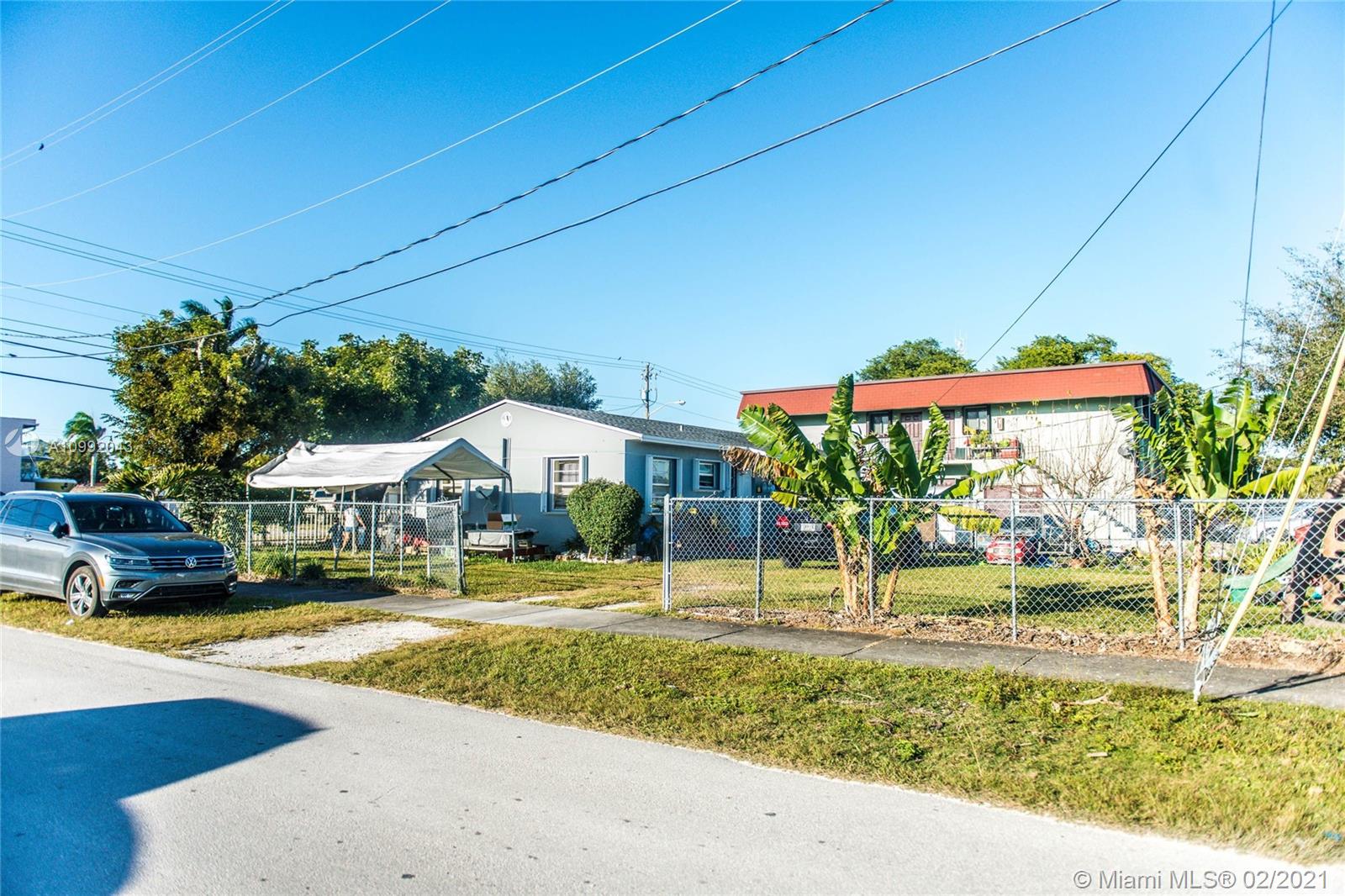 105 Northeast 2nd Road Homestead, FL 33030 - Photo 26 of 26 a front view of a house with a yard