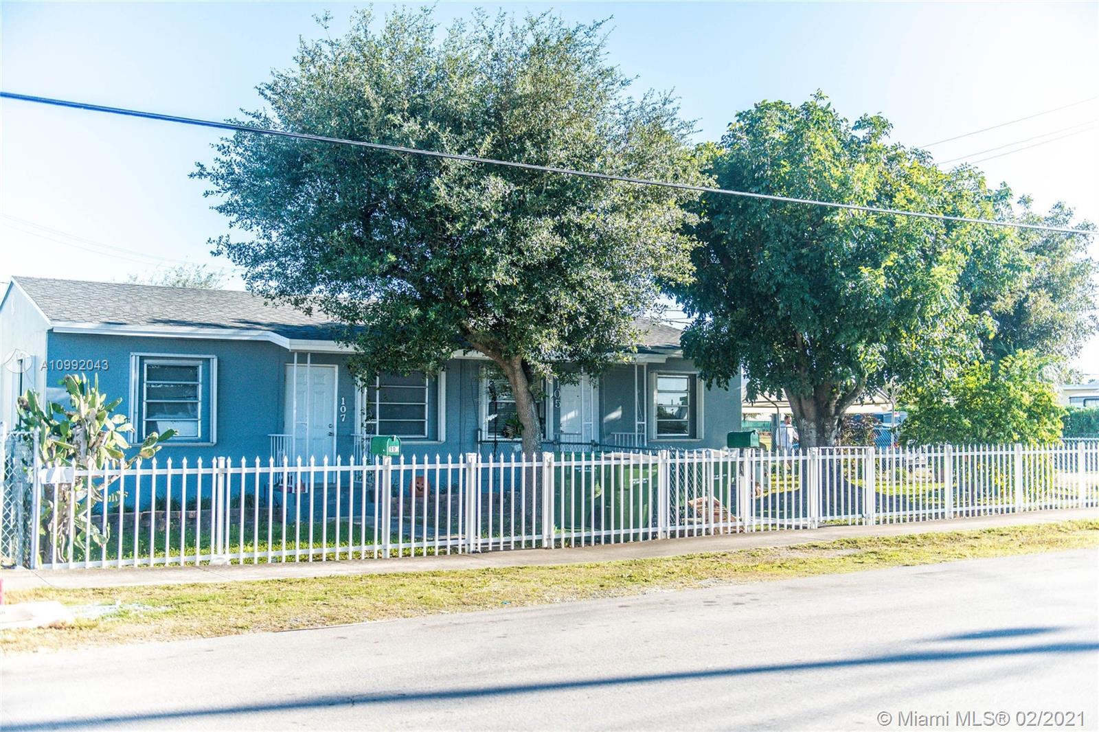 105 Northeast 2nd Road Homestead, FL 33030 - Photo 4 of 26 front view of a house with a porch