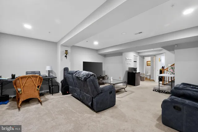 a living room with furniture and a couch