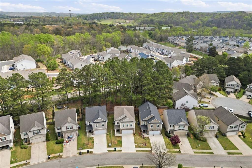 241 Bethany Manor Court Ball Ground, GA 30107 - Photo 5 of 36 an aerial view of multiple house