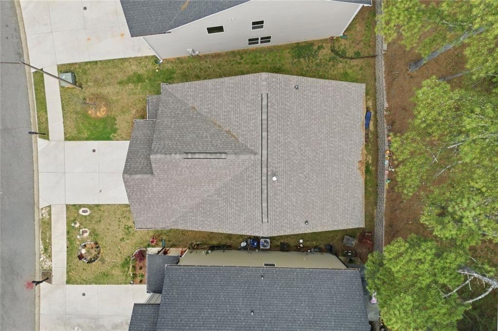 241 Bethany Manor Court Ball Ground, GA 30107 - Photo 6 of 36 an aerial view of a house with a yard