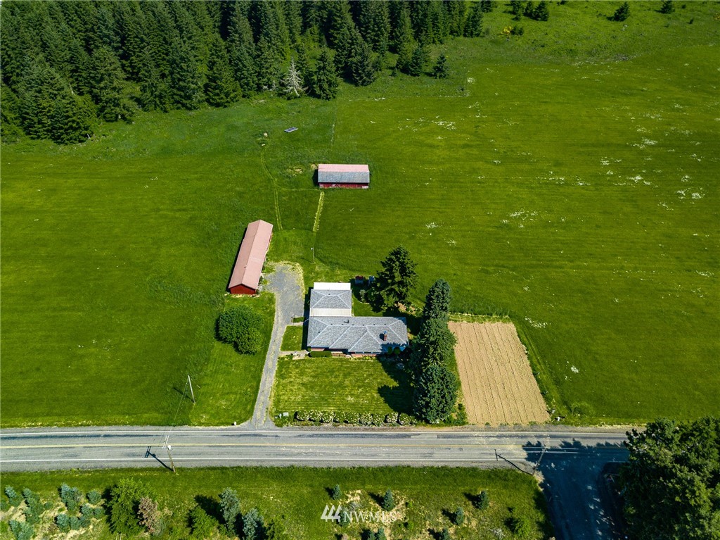 536 Brown Road East Chehalis, WA 98532 - Photo 2 of 38 a view of a golf course with a lake