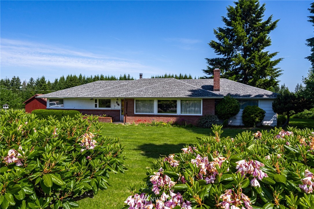 536 Brown Road East Chehalis, WA 98532 - Photo 4 of 38 a view of a house with a yard and garden