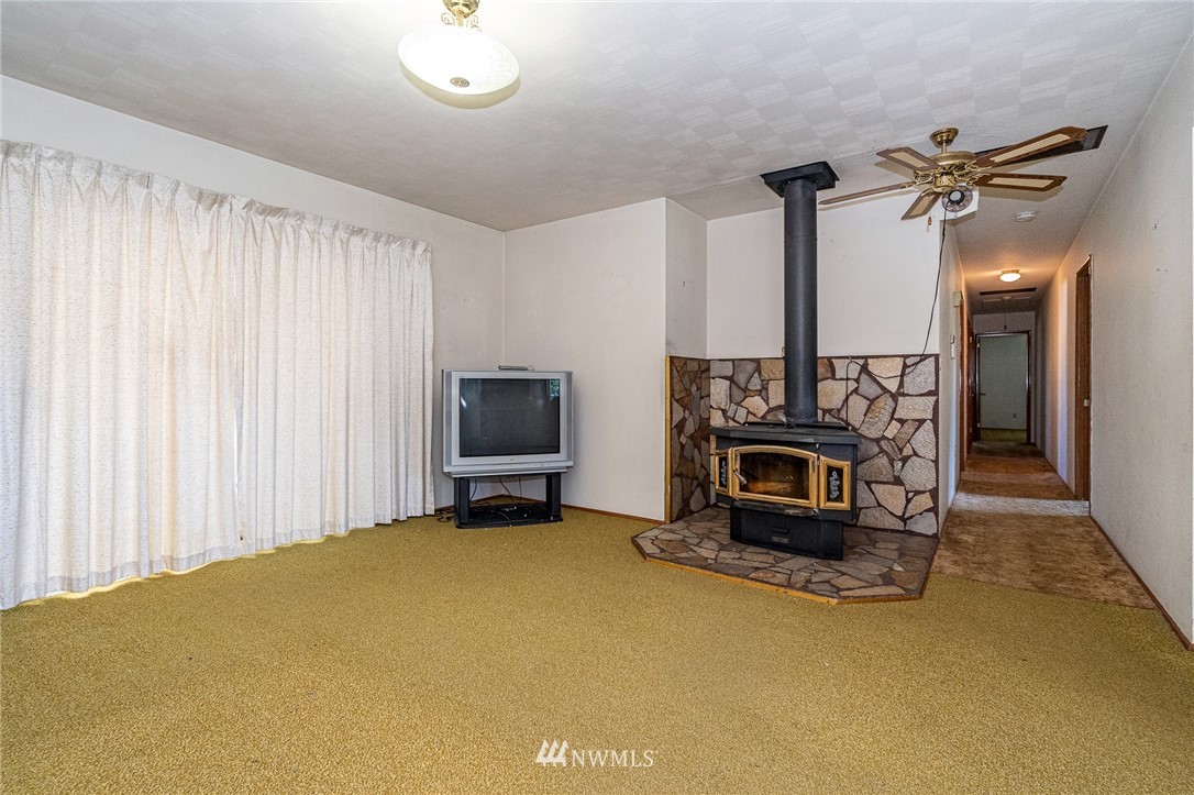 536 Brown Road East Chehalis, WA 98532 - Photo 8 of 38 a view of livingroom with furniture and a fireplace