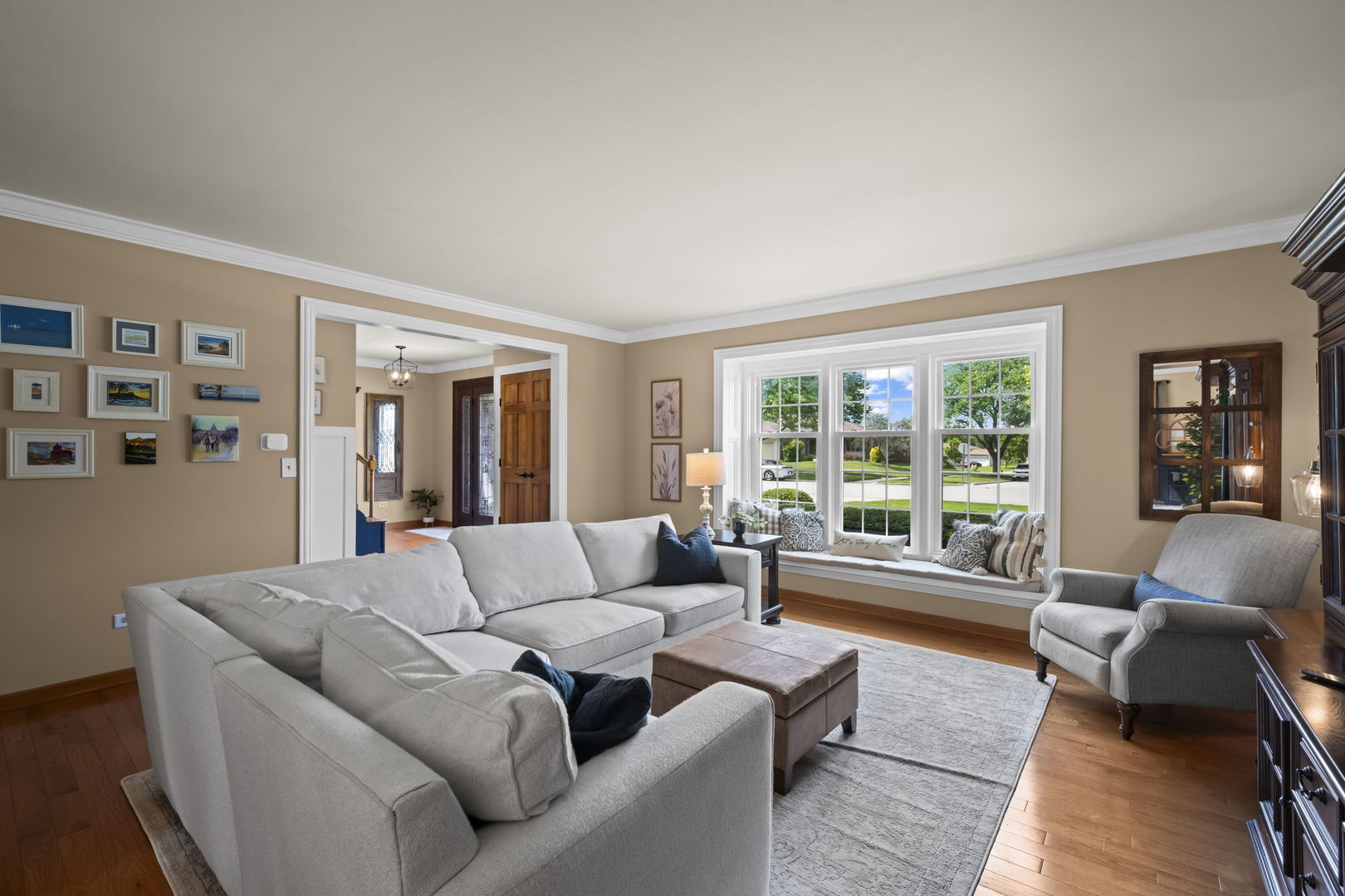 1565 Freeman Road Hoffman Estates, IL 60192 - Photo 13 of 46 a living room with furniture and a large window