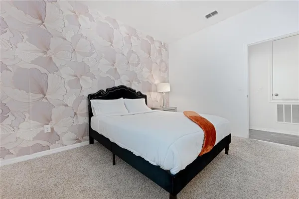 a view of a house with a yard and garage