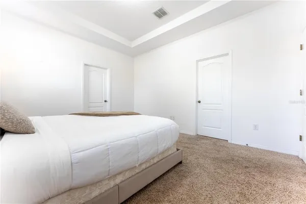 a kitchen with granite countertop stainless steel appliances and wooden cabinets