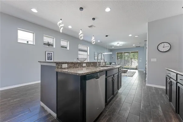 a living room with furniture and a table